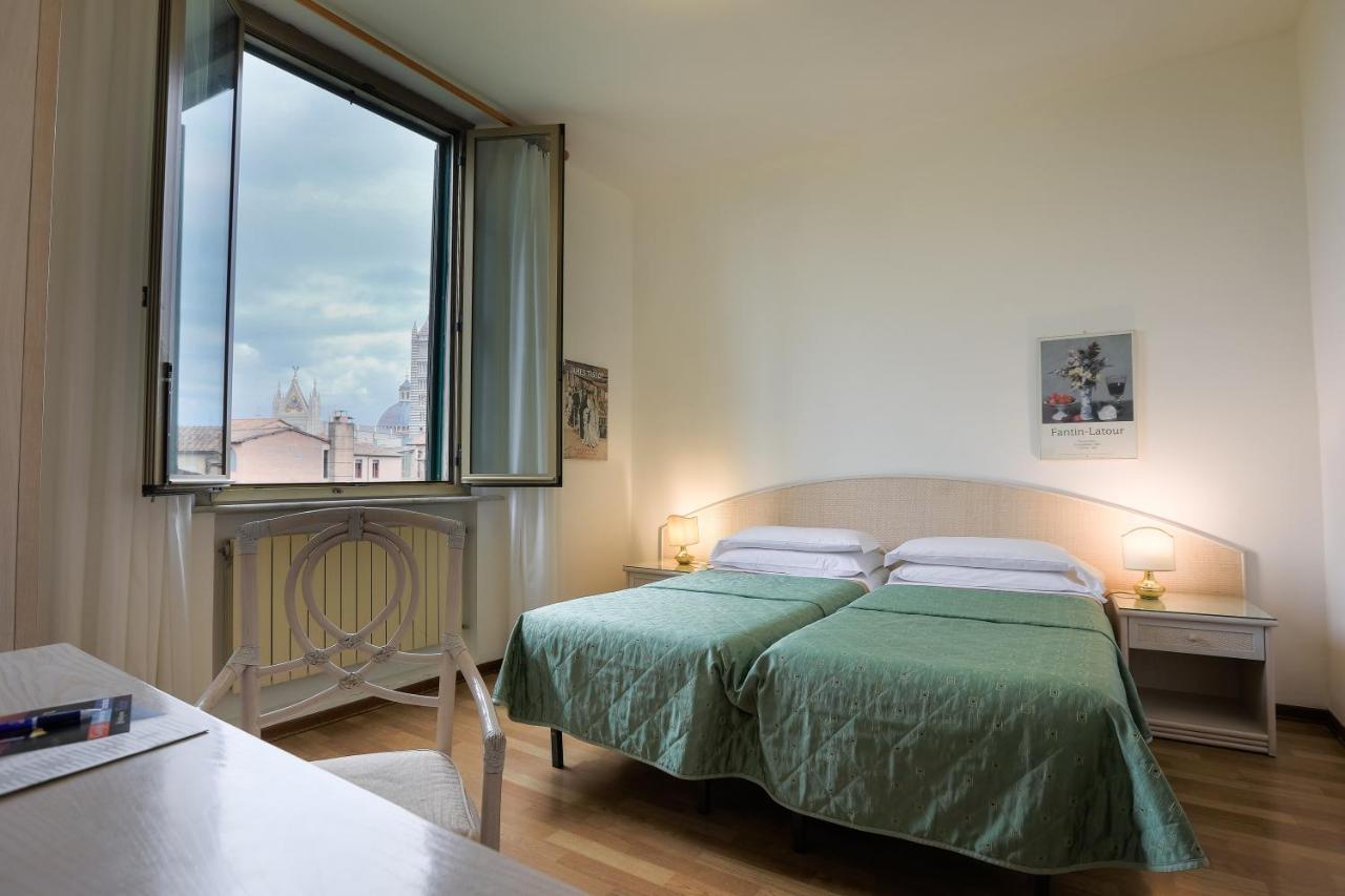 Hotel Duomo Siena Esterno foto